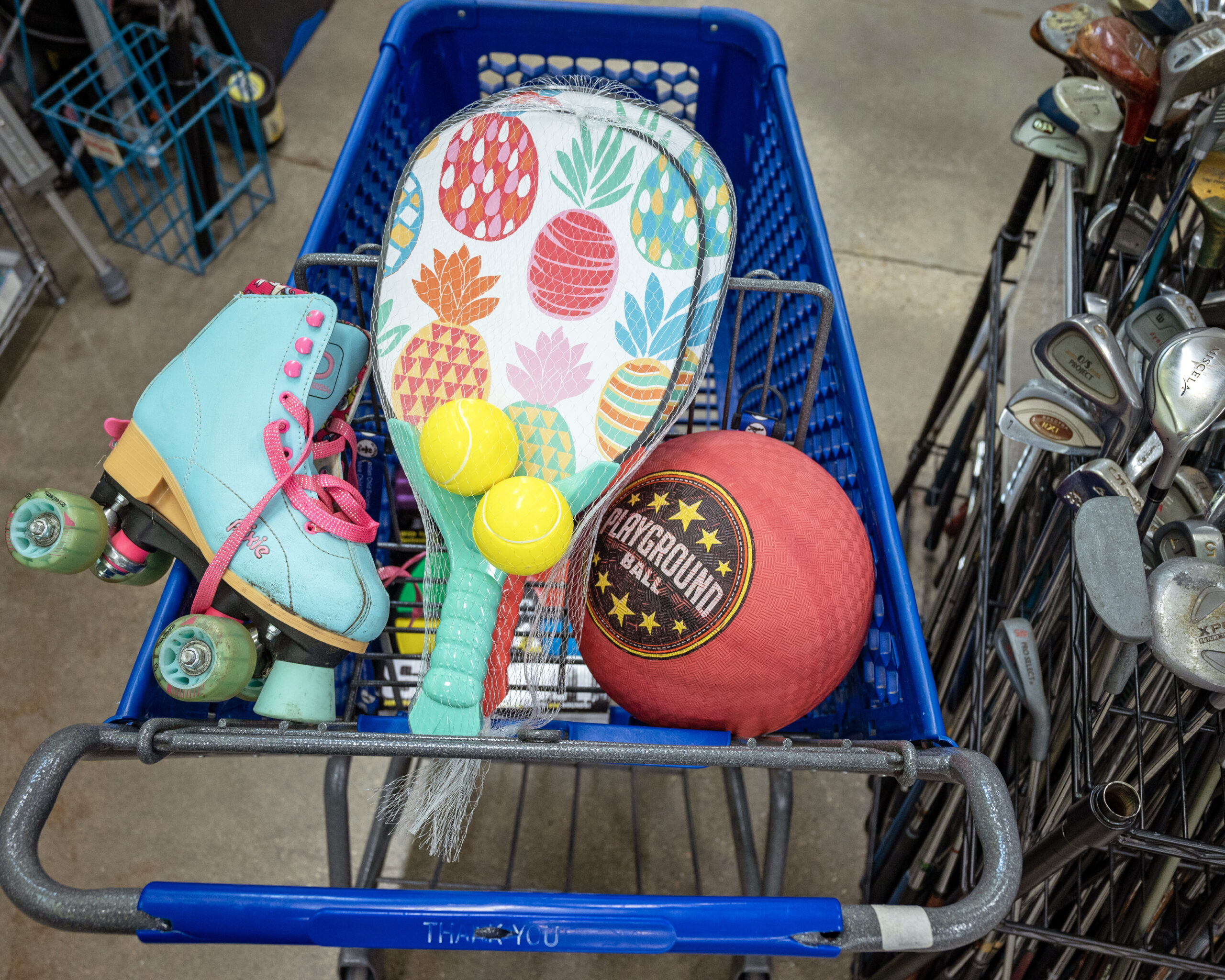 shopping cart with roller skates, table tennis game and ball
